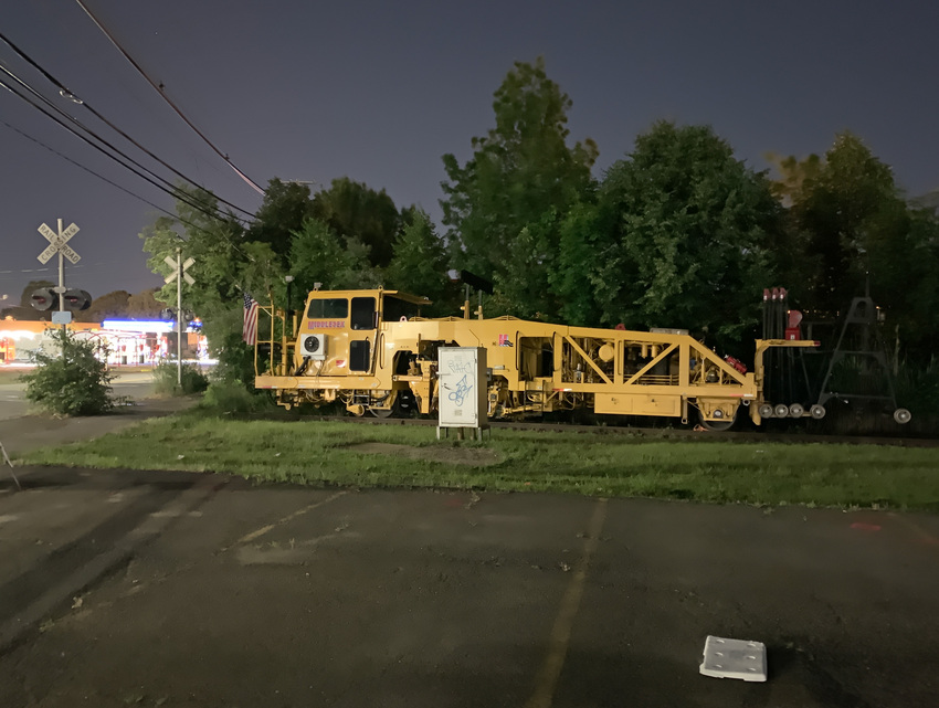 Parked Tamper on the Medford Branch The NERAIL New England Railroad